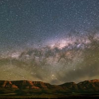 Wilpena Pound glows as the stars and milky way puts on a show 